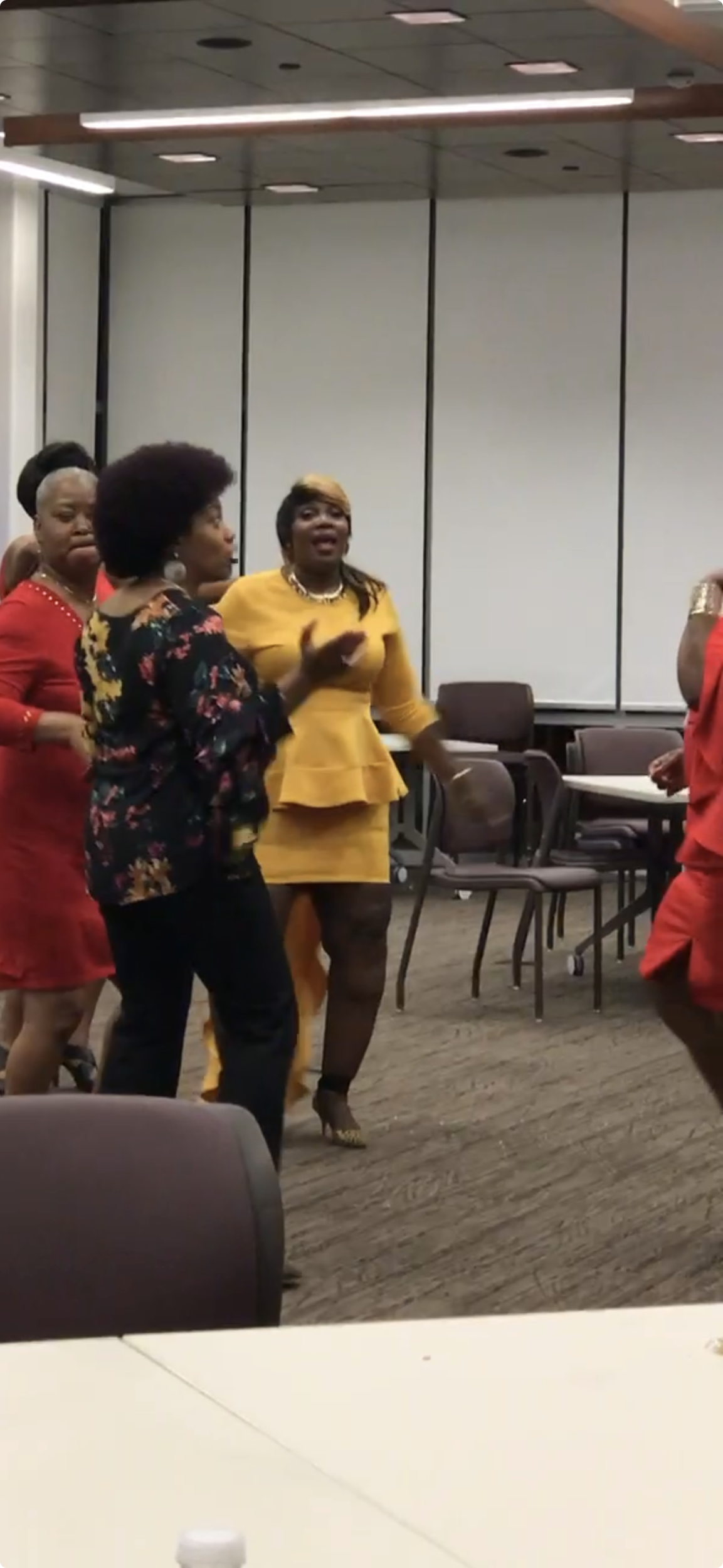 Renita directing youth choir